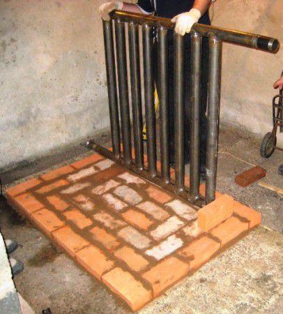 Installation eines Wasserkreislaufs beim Bau eines gemauerten Dickbauchofens
